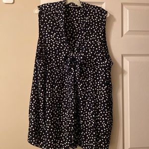 Navy blue & cream sleeveless blouse.